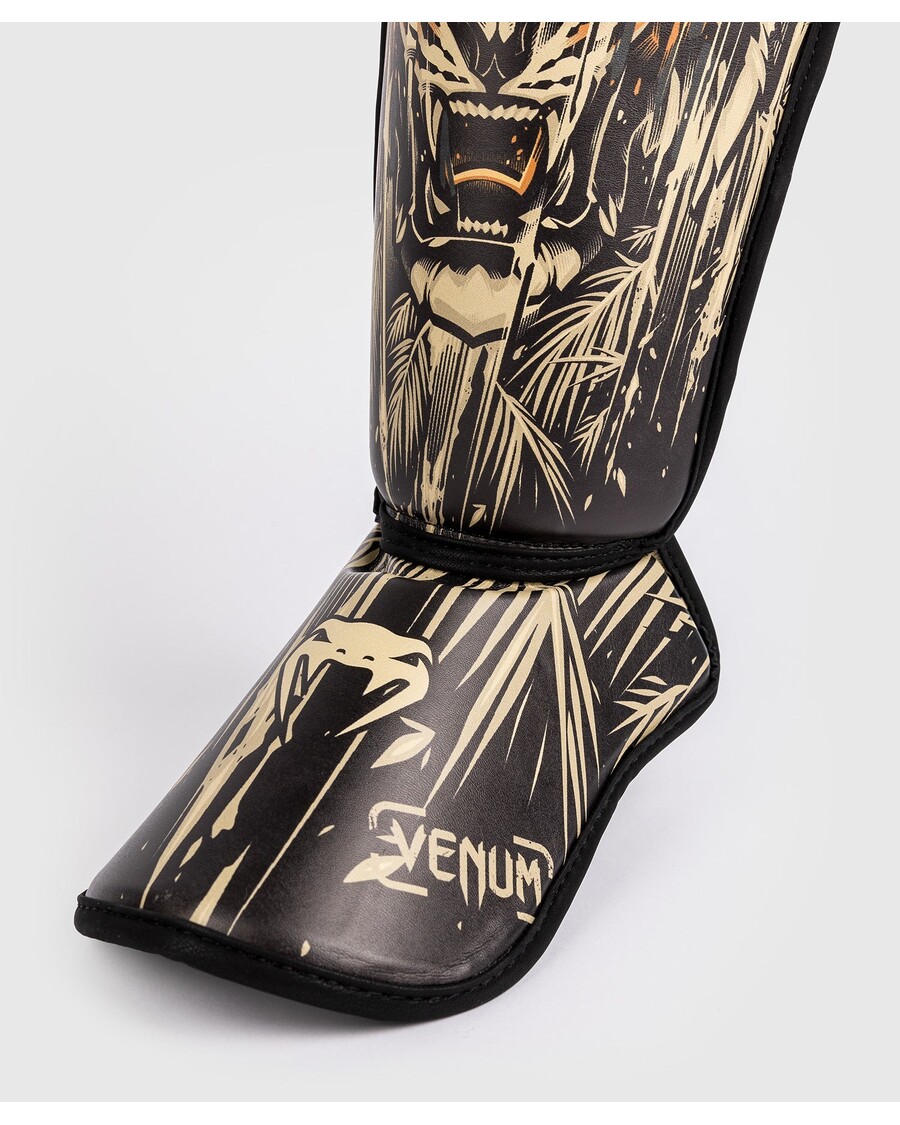 محافظ ساق پا بچه ببر ونوم - مشکی/نارنجی نئون