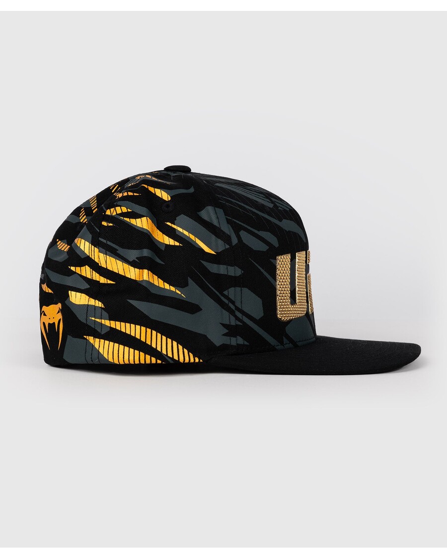 قبعة يو اف سي فيوجن باي فينوم الرياضية الليلية الأصلية - البطل