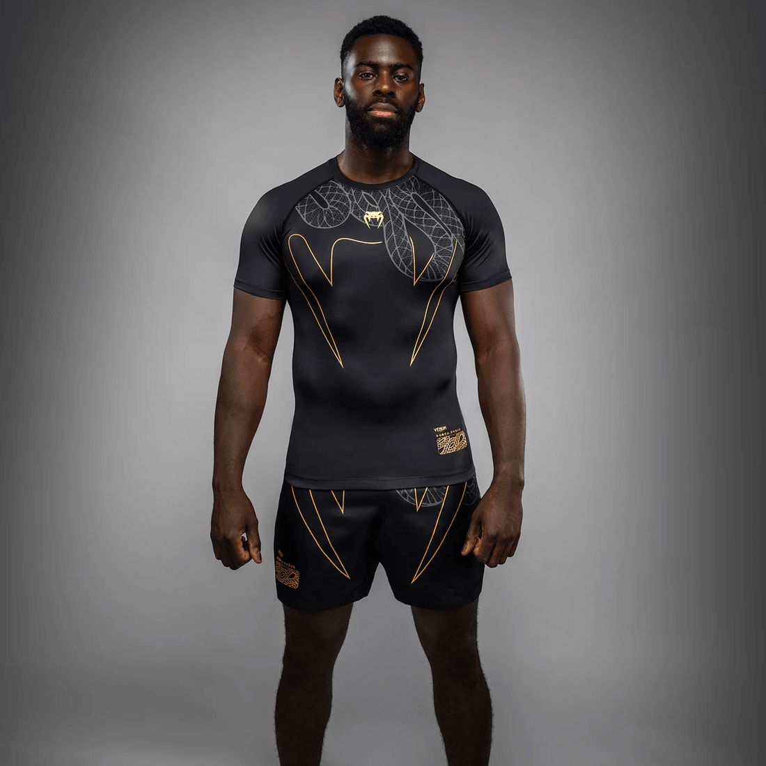 Venum Serpenti Short Sleeve Rashguard - Black/Silver/Gold